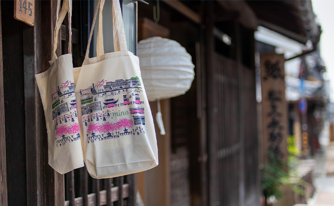 うだつの上がる町並みが散策できるペアレンタサイクル券（電動自転車） トートバック付き 体験チケット 走る 観光 観光地 イベント イラスト 探索 